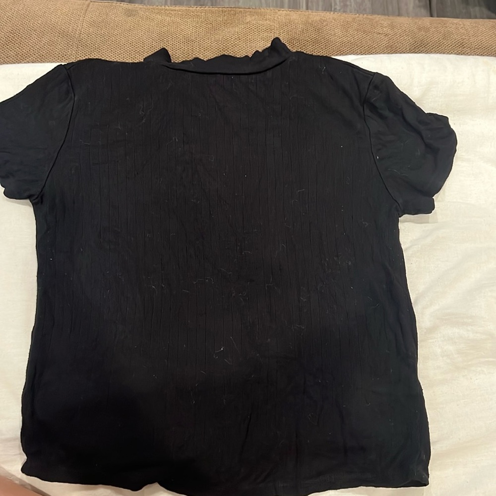Black short turtle neck crop top shirt. Very stretchy and soft material size M
